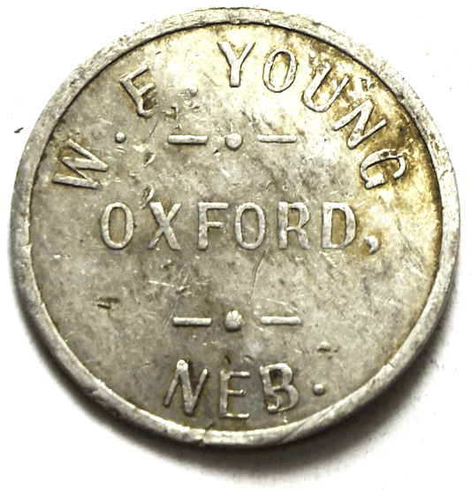 WF Young Oxford Nebraska Aluminum Trade Token 27mm